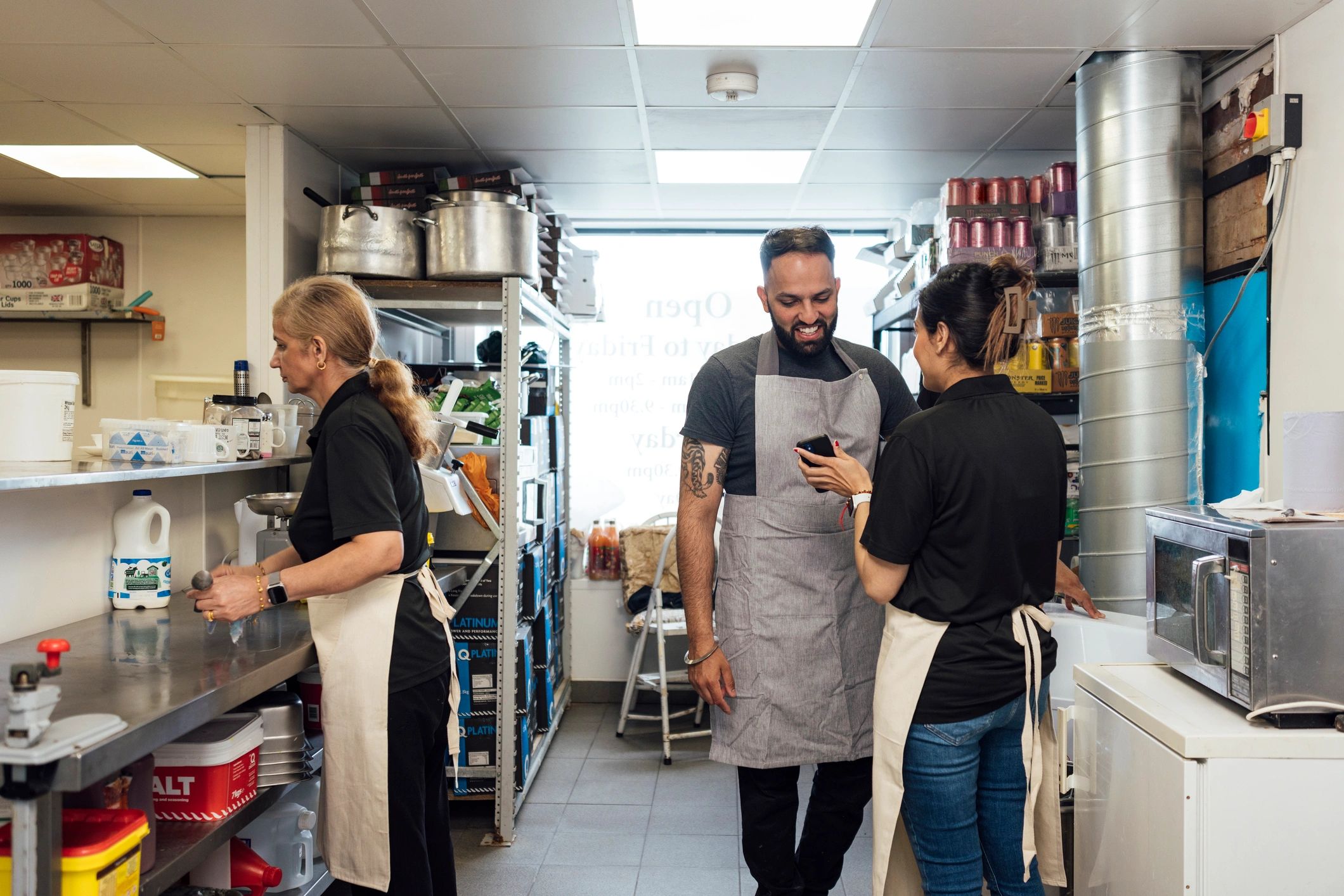 Restaurant team working together in a kitchen